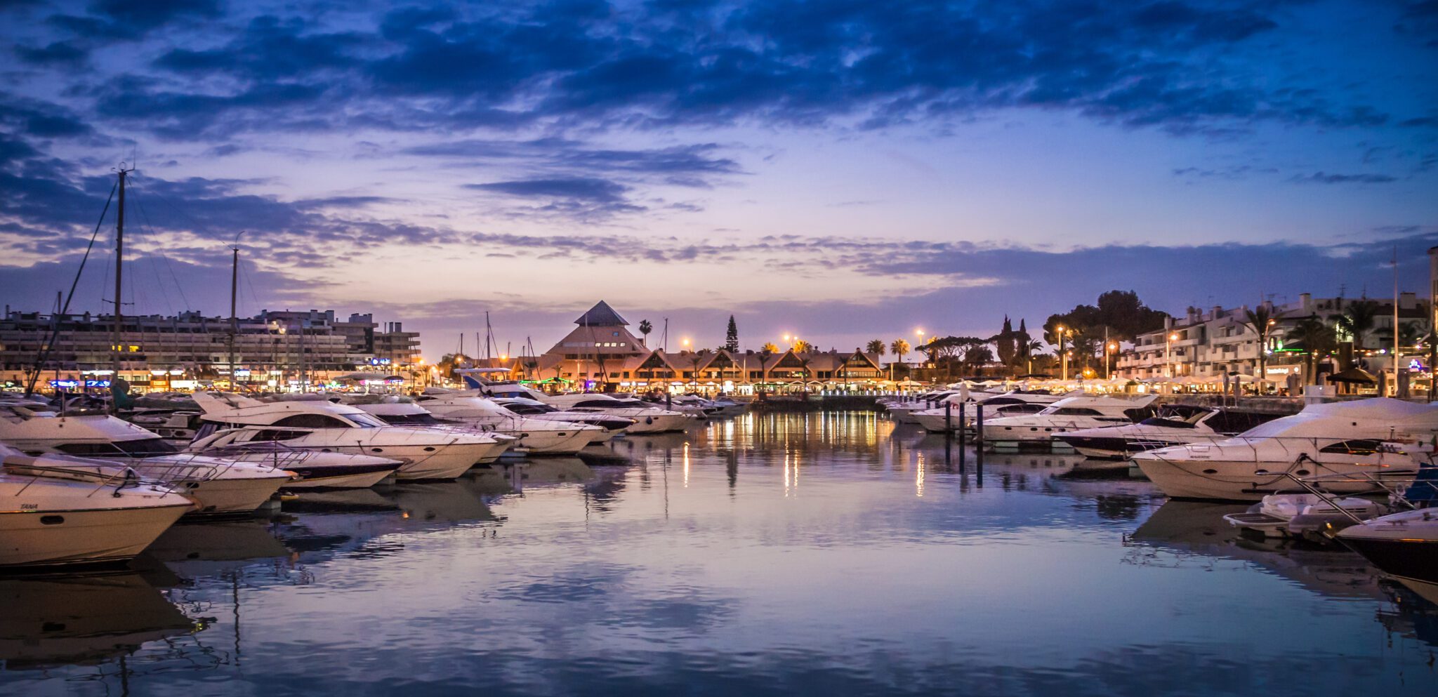 Panorama,view,of,boats,in,vilamoura,marina,during,sunset